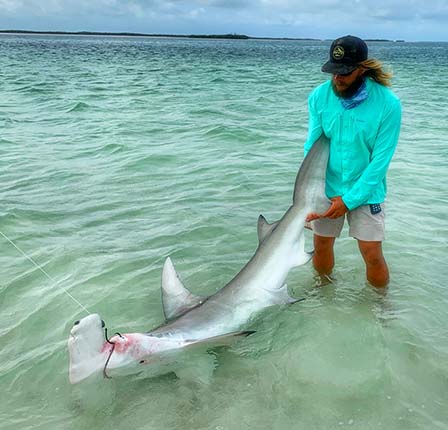 capt craig with a lower keys shark